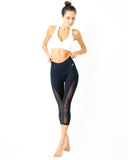 l'Espace Low-Waisted Capri Leggings With Mesh Panels and Reflective Strips