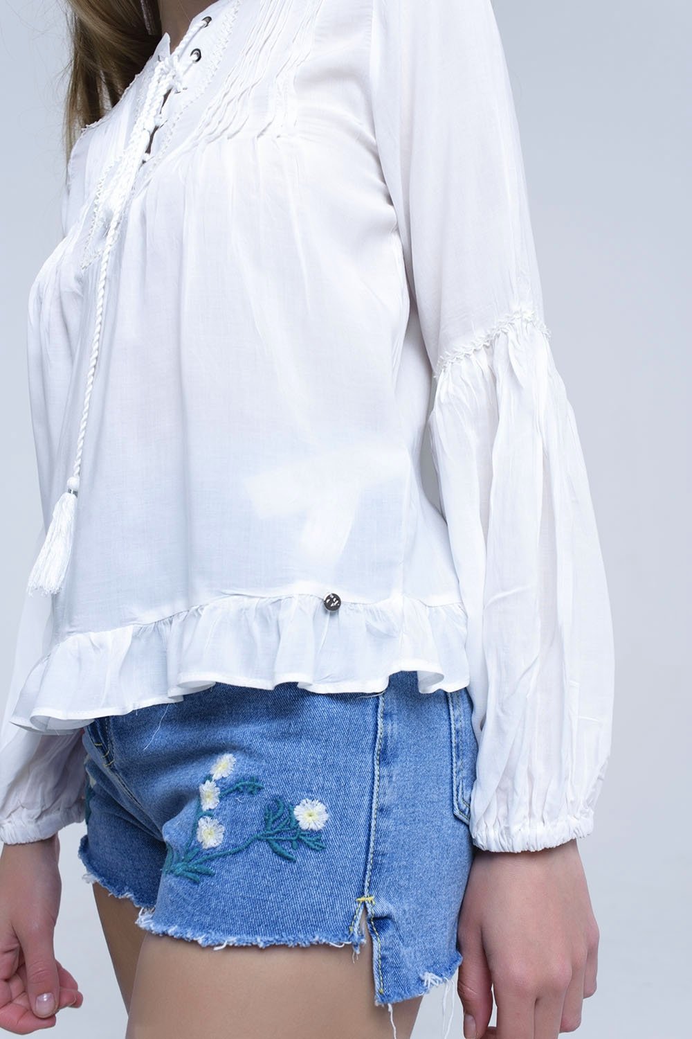 White Lace Up Top With Ruffle Detail