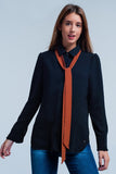 Black Shirt With Polka Dots and Orange Tie